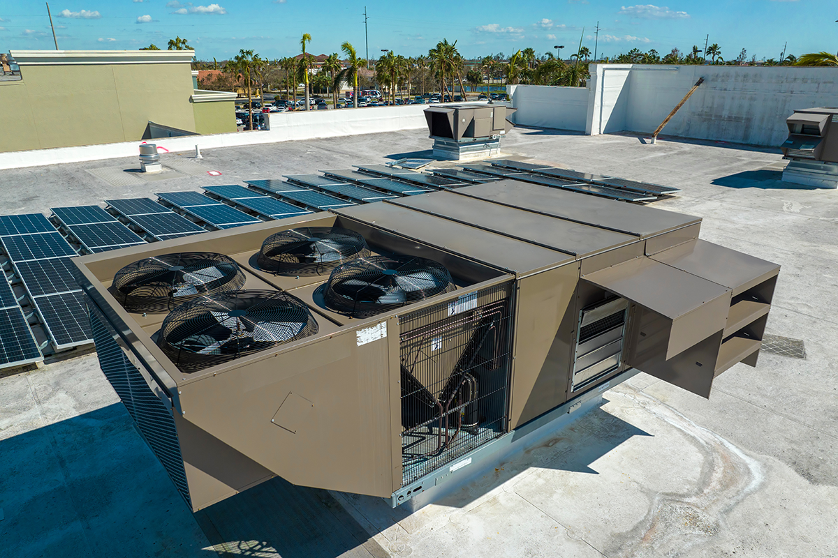 Commercial HVAC maintenance image of a rooftop packaged unit on a business property